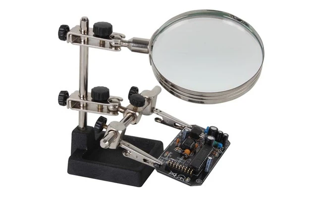 Soporte para circuitos impresos con lupa