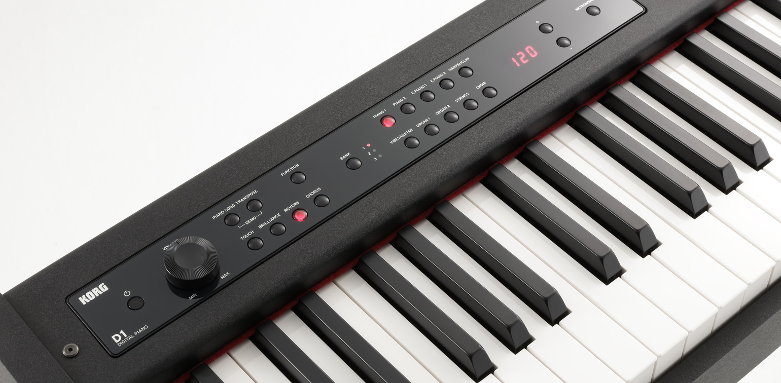 Pormenor do painel de controlo do Korg D1 com o ecrã, os botões de som e os botões de efeitos