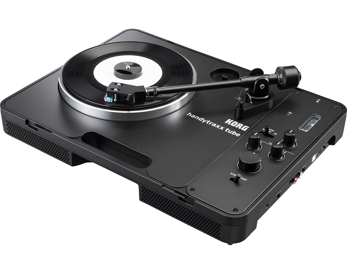 Korg handytraxx tube preto em vista três quartos com um single no prato e a cápsula JICO